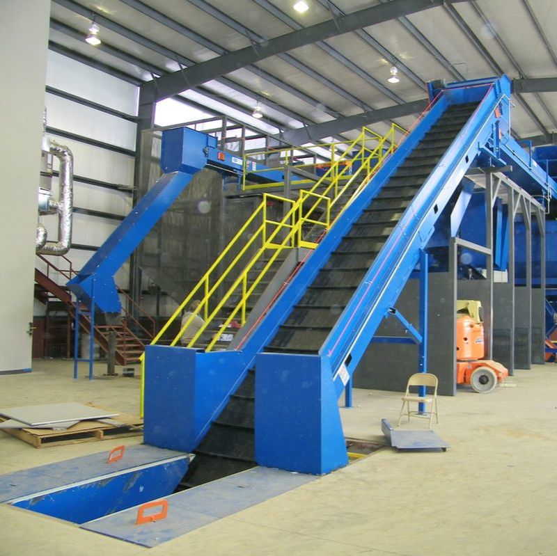 Slider bed infeed conveyor