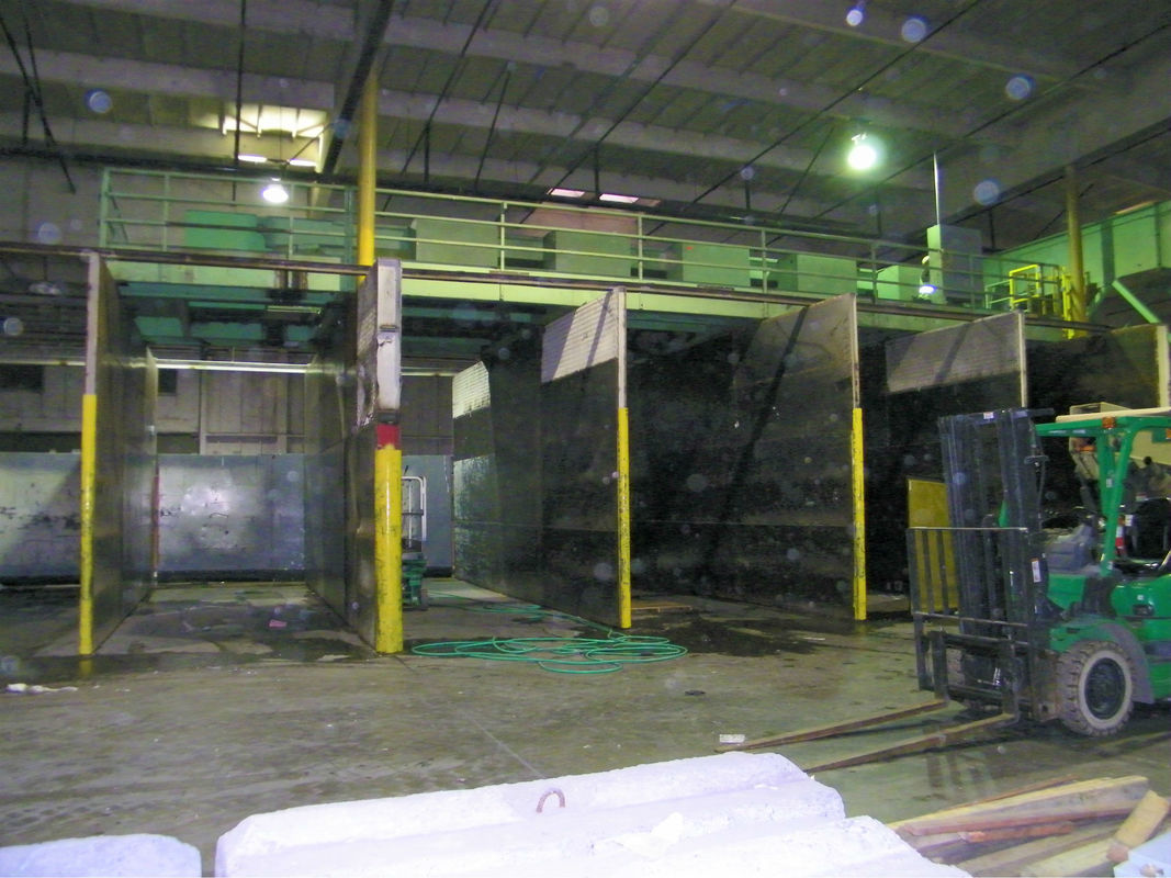 Rebuilt sort line platform and sorting conveyor installed over existing bunker walls