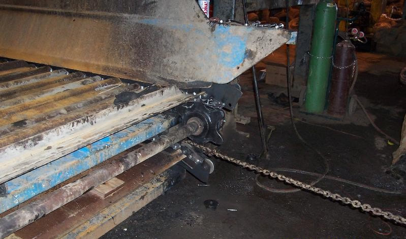 Chain belt conveyor frame with the belt removed for replacement
