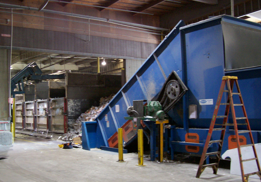 Add-on elbow-up head section attached to the existing drag chain conveyor