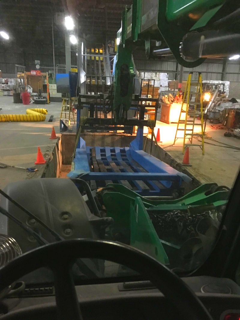 New pre-fabricated conveyor section being lowered and fitted to the existing conveyor