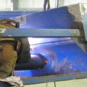 Used conveyor being modified, repaired, and refurbished