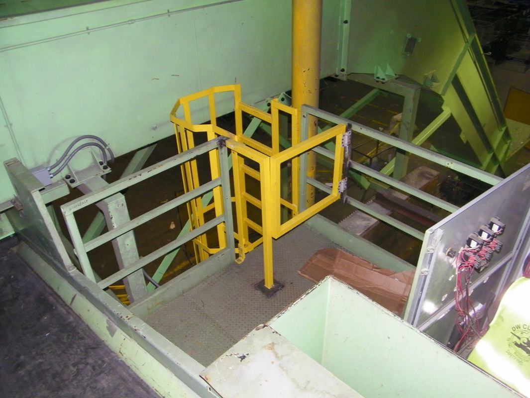 Remcon custom caged ladder with self-closing safety gate for maintenance access