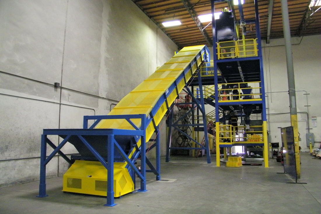 Remcon infeed conveyor with above-ground loading hopper