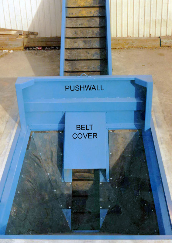 Remcon infeed conveyor with in-ground loading pit and pushwall