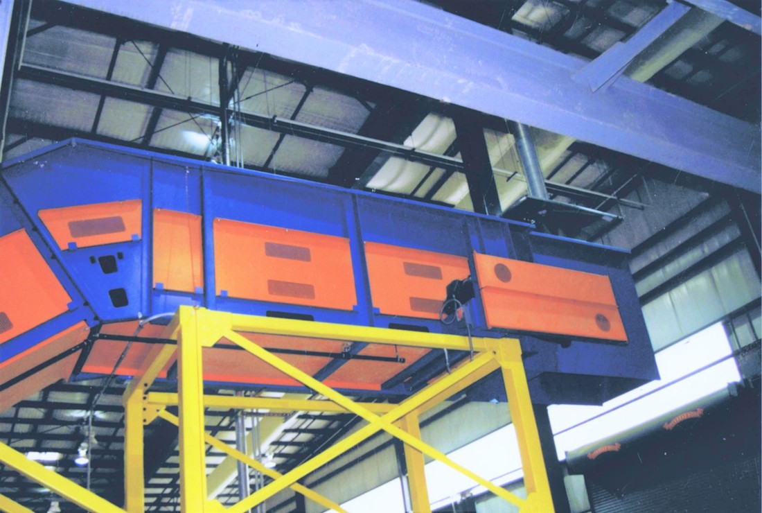 Roller chain baler feed conveyor with custom baler hood