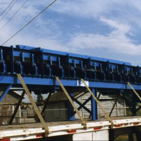 Troughing idler conveyor for a silver mine showing the troughed belt on idler rollers