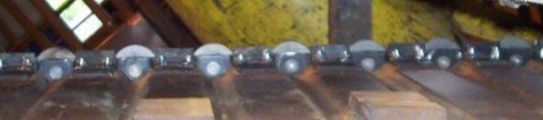 Roller chain with steel belt conveyor, close-up