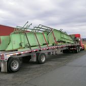 Used conveyor equipment loaded onto a semi trailer for relocation